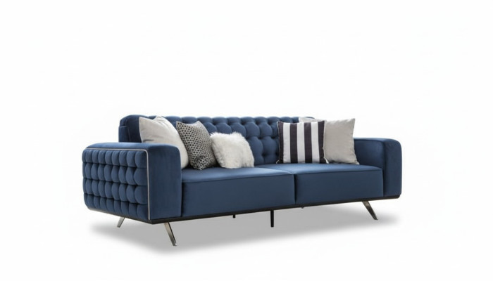 Sofá Chesterfield clásico de tres plazas de lujo azul.