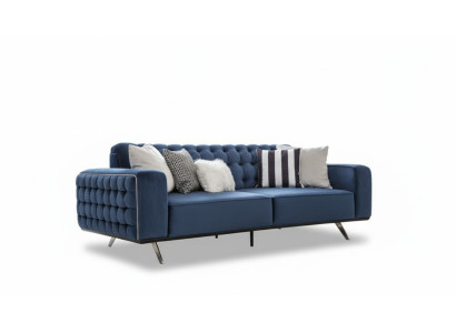 Sofá Chesterfield clásico de tres plazas de lujo azul.