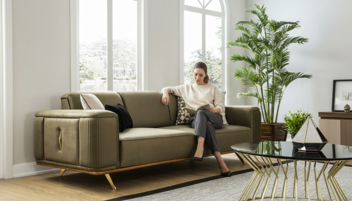 Sofá Chesterfield de 4 plazas para sala de estar, diseño de cuatro plazas en tela negra.