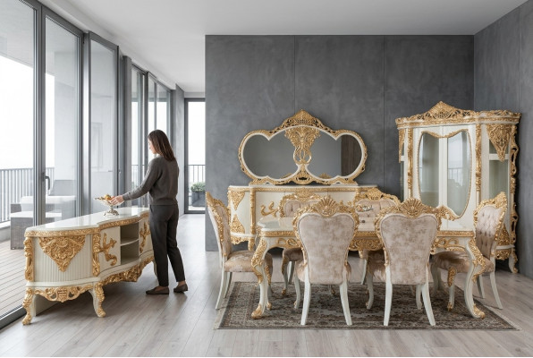 Magnífico conjunto de muebles de comedor con abundantes elementos decorativos.