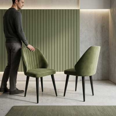 Silla verde con patas de madera negra para el comedor, nuevo modelo cómodo.