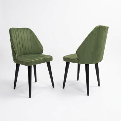 Silla verde con patas de madera negra para el comedor, nuevo modelo cómodo.