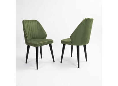 Silla verde con patas de madera negra para el comedor, nuevo modelo cómodo.