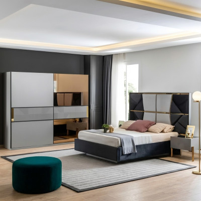 Juego de muebles de dormitorio perfecto en tonos grises con incrustaciones doradas.