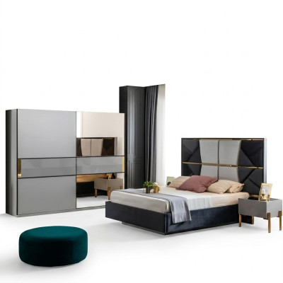 Juego de muebles de dormitorio perfecto en tonos grises con incrustaciones doradas.