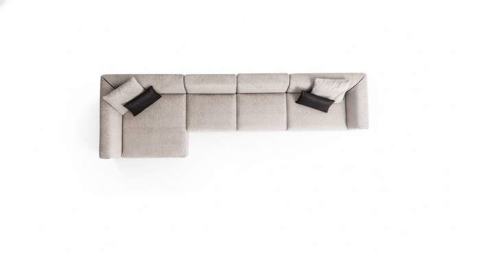 Sofá esquinero en forma de L de color beige para sala de estar, diseño de tela moderno.