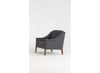 Silla de oficina gris de diseño moderno tapizada para el trabajo de la habitación.