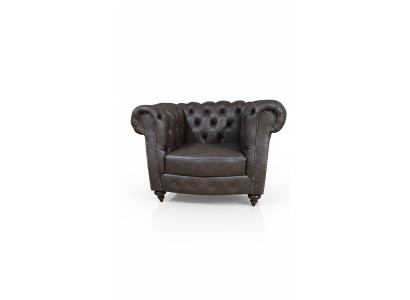 Sofá Chesterfield de una plaza de cuero de lujo.
