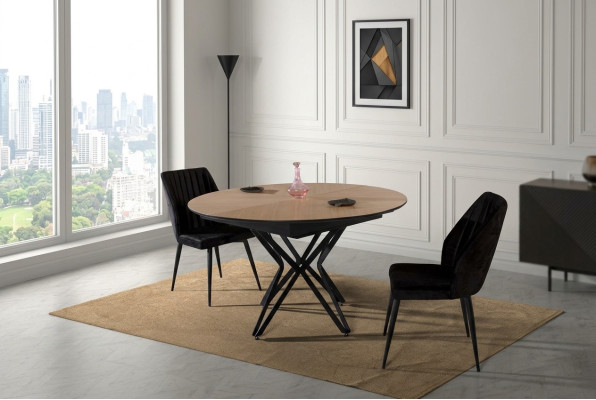 Mesa de comedor redonda extensible moderna de madera marrón.