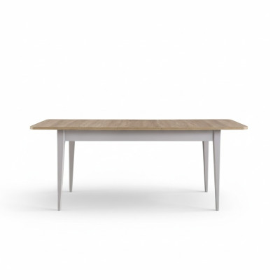 Mesa extensible de comedor de madera gris.