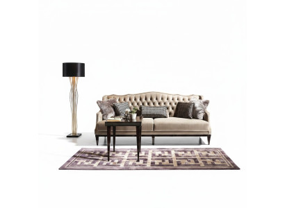 Sofá Chesterfield de tres plazas elegante en gris - muebles tapizados atemporales para tu hogar.