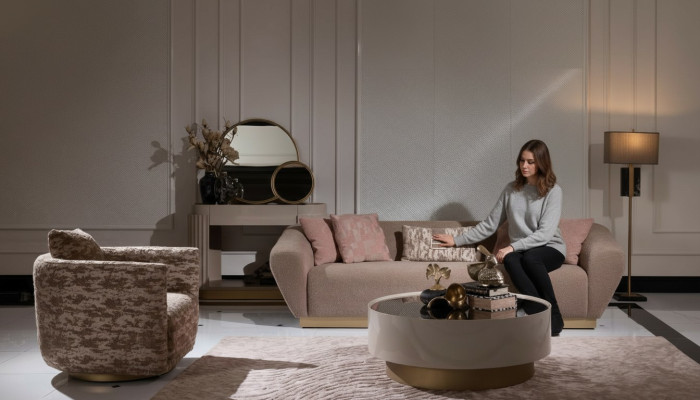 Conjunto de sofá de 3 plazas, sillón, mesa de centro y cómoda de tela beige de 5 piezas.