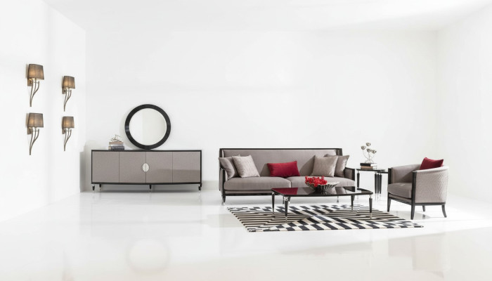 Conjunto completo de sofá de tres plazas, sillón y mesa de centro en gris.