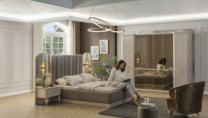 Dormitorio de lujo cama doble de diseñador armario mesitas de noche