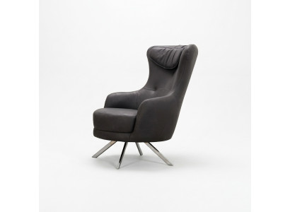 Sillón de cuero negro orejero sala de estar lujoso de una sola plaza.