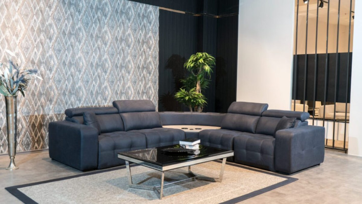 Sofá esquinero en forma de L, sofá de cuero grande, gris, diseño de salón.