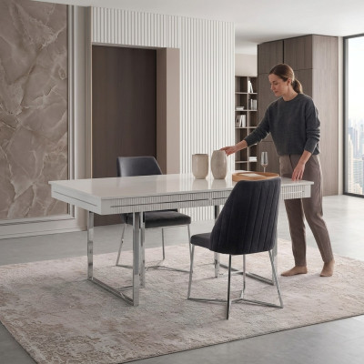 Mesa de comedor moderna extensible de madera blanca para el comedor.