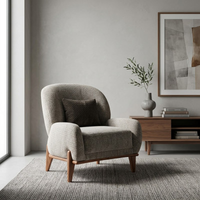 Sillón orejero de tela gris con cojín acolchado para el salón de estar de una plaza.