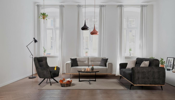 Conjunto de sofás gris oscuro y gris, lujosos sillones de tela, muebles de salón modernos.
