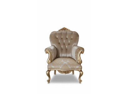 Sillón clásico con decoración beige y diseño Chesterfield para la sala de estar.