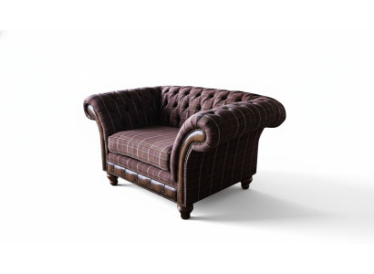 Chesterfield sofá de 1 asiento tapizado de tela de lujo.