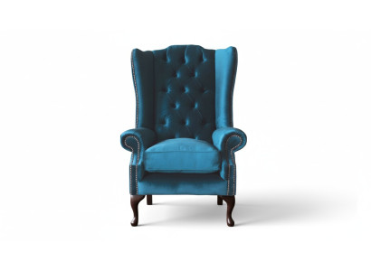 Sillón de orejas gris diseño tapizado Chesterfield textil salón