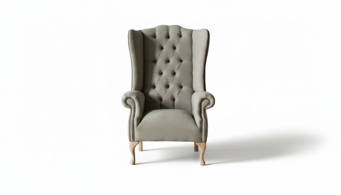 Sillón gris de orejas diseño tapizado Chesterfield textil sala de estar