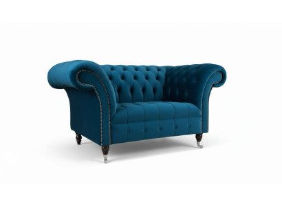 Sillón Chesterfield diseño sofá azul tela muebles.