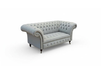 Sofá Chesterfield de dos plazas en gris, muebles tapizados en cuero.
