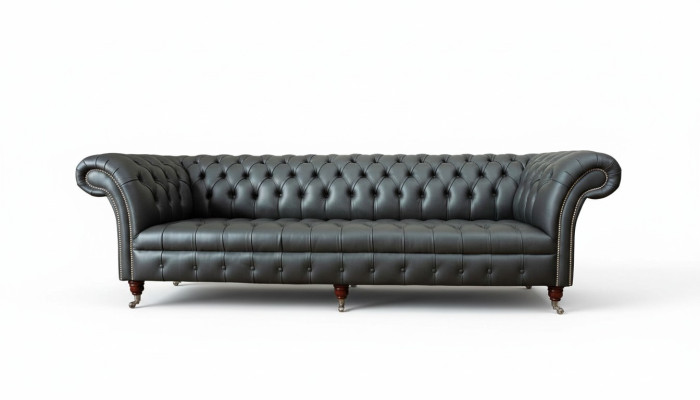 Sofá de lujo de cuatro plazas Chesterfield inglés de diseño en tela para sala de estar.