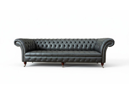 Sofá de lujo de cuatro plazas Chesterfield inglés de diseño en tela para sala de estar.