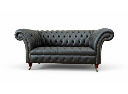 Sofá de cuero Chesterfield de dos plazas para diseñadores.