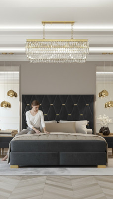 Conjunto de dormitorio gris de diseñador con cama doble de acero inoxidable y mesitas de noche.
