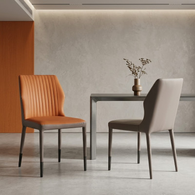 Sillas de comedor de lujo de un solo asiento de madera con estampado de tela marrón.