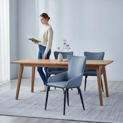 Silla de comedor azul tapizada, sillón moderno de diseñador de cuero de una plaza.