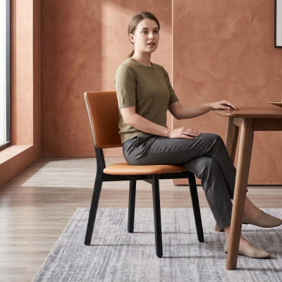 Silla de comedor de lujo tapizada naranja y negra mueble de madera.