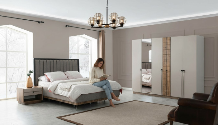 Dormitorio moderno con juego textil, cama doble de madera y armario de 4 piezas.