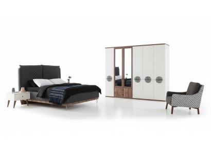 Moderno conjunto de dormitorio: cama doble de diseño, armario, mesitas de noche.