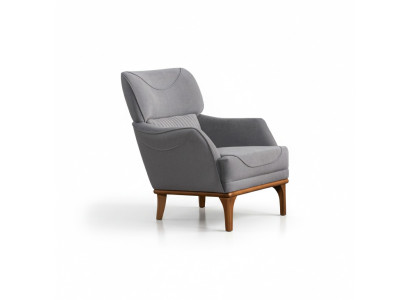 Cómodo sillón gris de lujo en tela para la sala de estar nuevo.