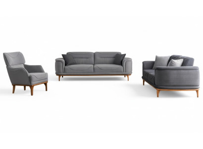 Lujo sala de estar tapizada en gris: Dos sofás de tres plazas y sillón nuevo.