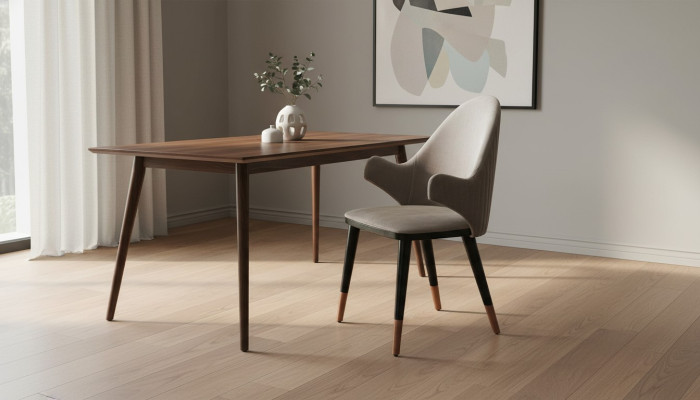 Silla exclusiva beige con diseño de patas de madera negra para comedor novedoso.