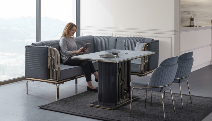 Conjunto exclusivo de comedor gris, mesa de acero inoxidable de lujo, 2 sillas textiles.