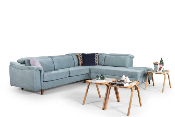 Sofá esquinero azul en forma de L para sala de estar con cojines y armazón de madera de diseñador
