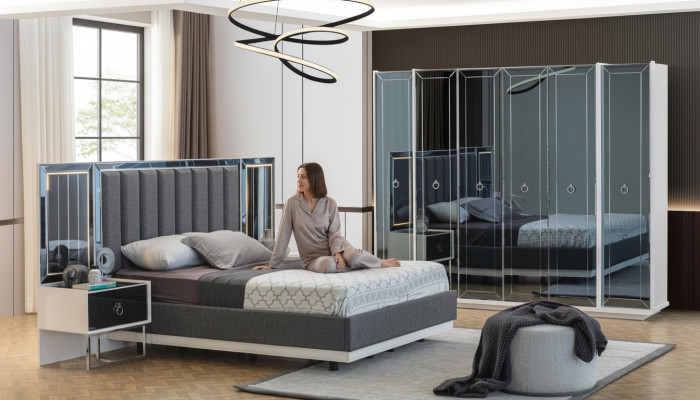 Conjunto de dormitorio de diseñador, cama doble, mesita de noche, armario.