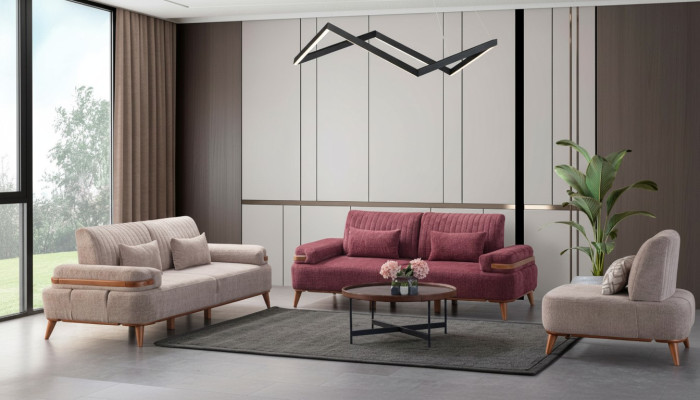 Conjunto de sofá en color beige-rosa. Sofá exclusivo de tres plazas con tapizado.