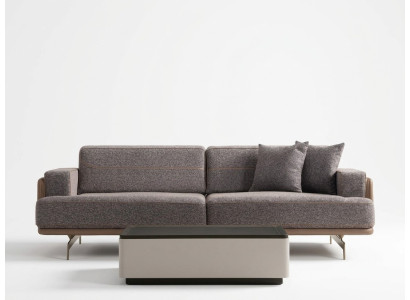Sofá de diseñador de lujo de tres plazas gris para la sala de estar.