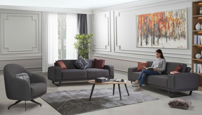 Conjunto de sala de estar de lujo compuesto por un sofá de diseño de color negro de 3 piezas.