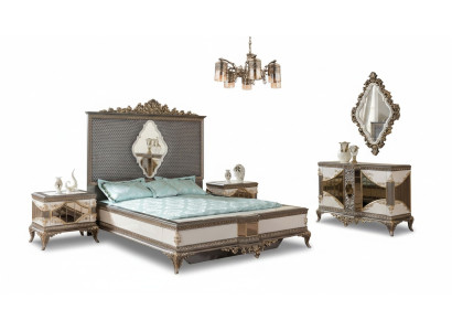 Conjunto de dormitorio clásico de alta calidad con cama doble, cómoda y sofá.