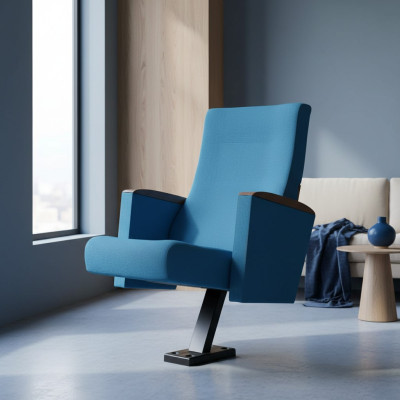 Silla de cine, silla de teatro tapizada con reposapiés fijo y respaldo reclinable.