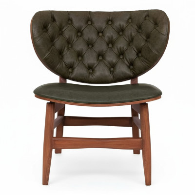 Moderno sillón Chesterfield verde tapizado.